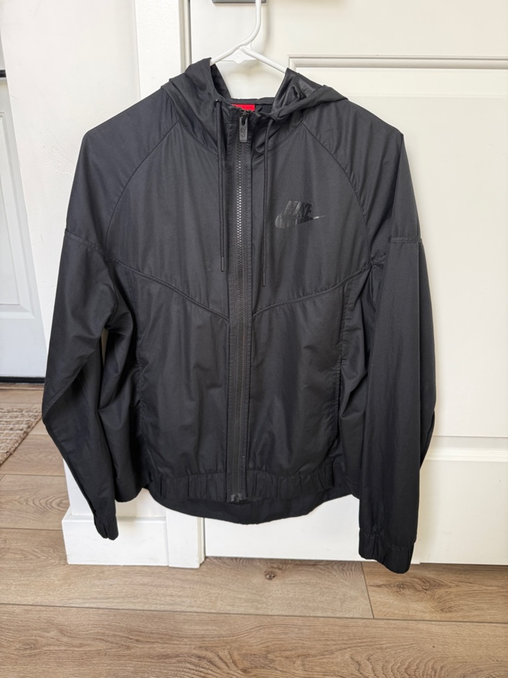 Women’s Nike Black Hooded Windbreaker with Subtle Logo
